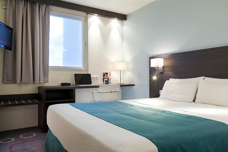 Kyriad Gare - Grand Palais Hotel