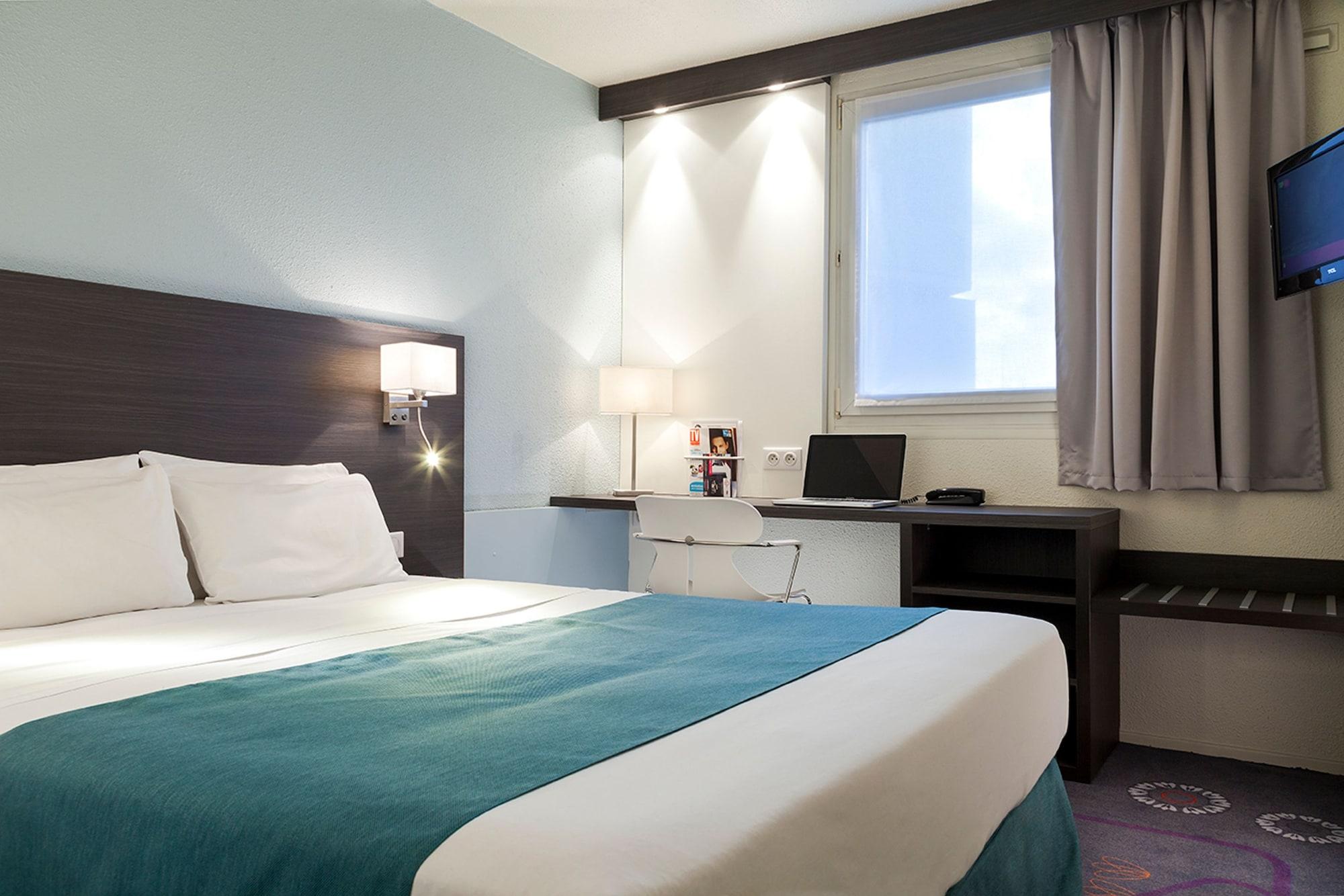 Kyriad Gare - Grand Palais Hotel 3*
