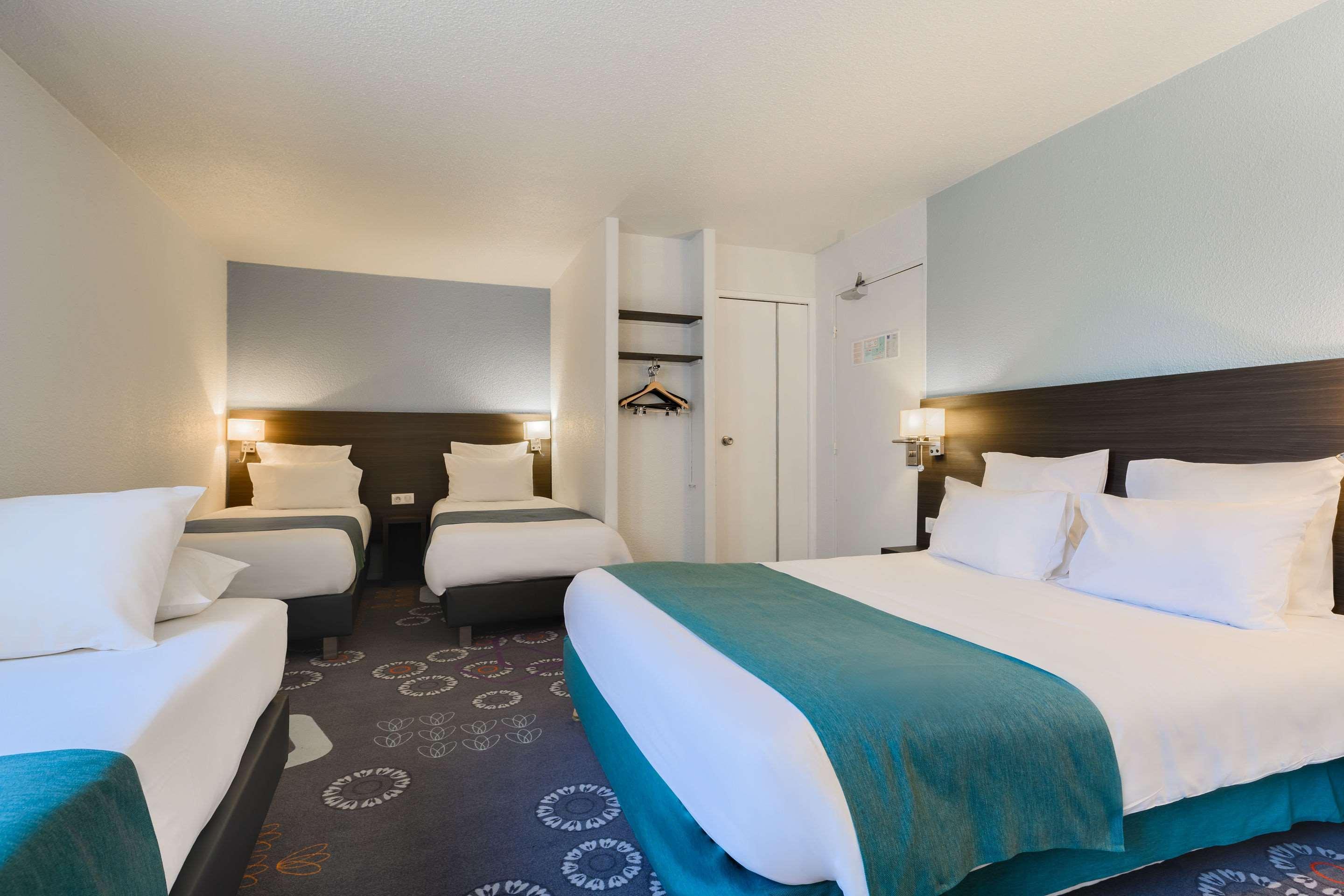 Kyriad Gare - Grand Palais Hotel 3*