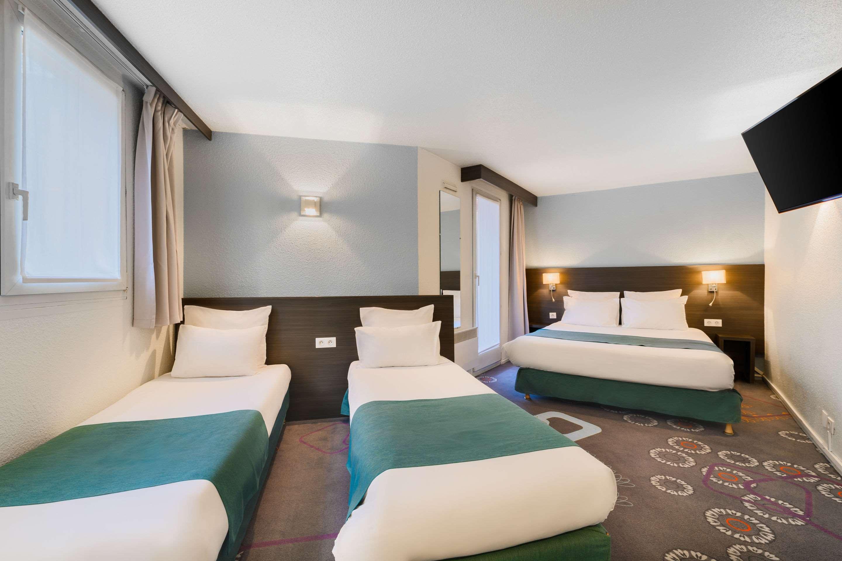 Kyriad Gare - Grand Palais Hotel 3*