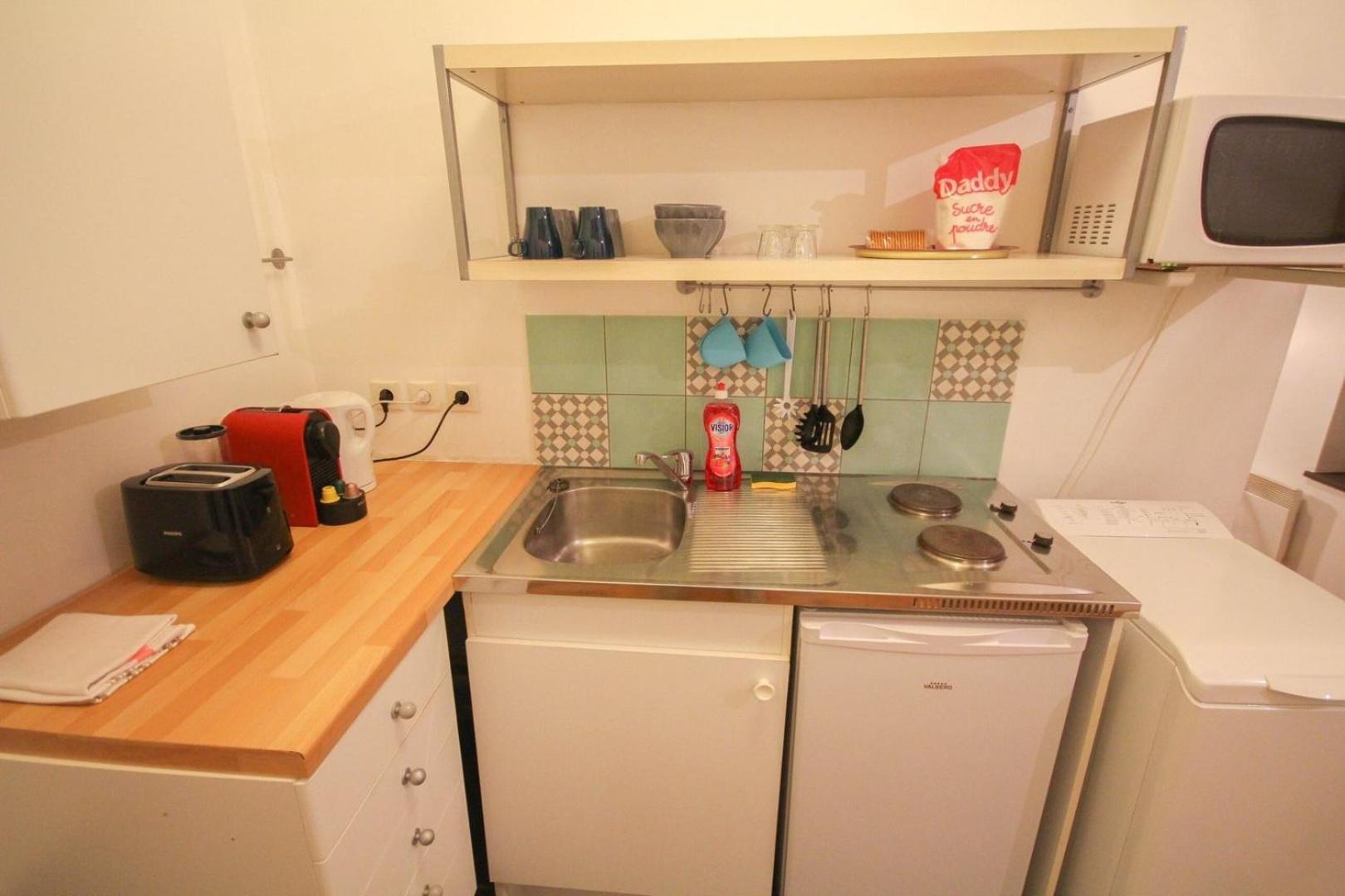 In A Typical Street Apartment *