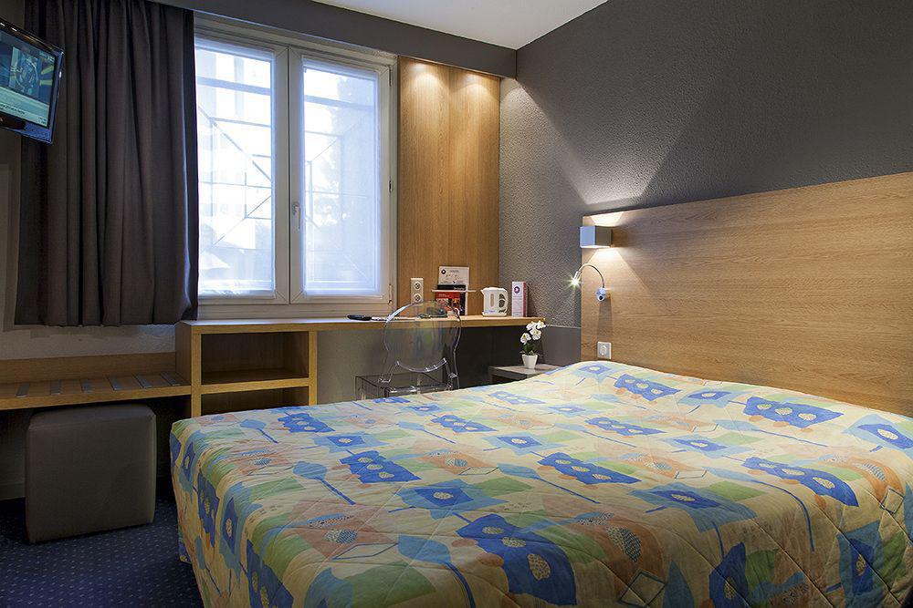 Kyriad Gare - Grand Palais Hotel 3*