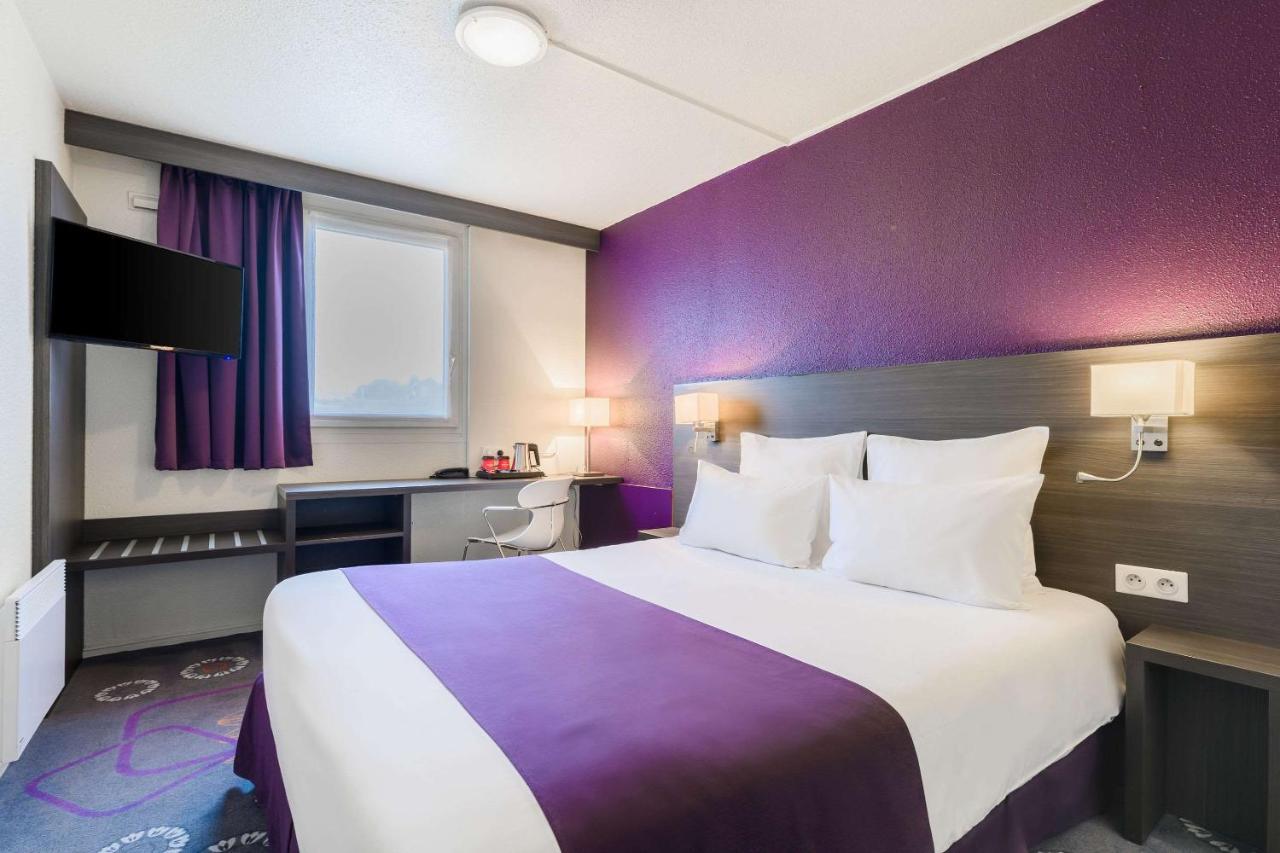 Kyriad Gare - Grand Palais Hotel 3*